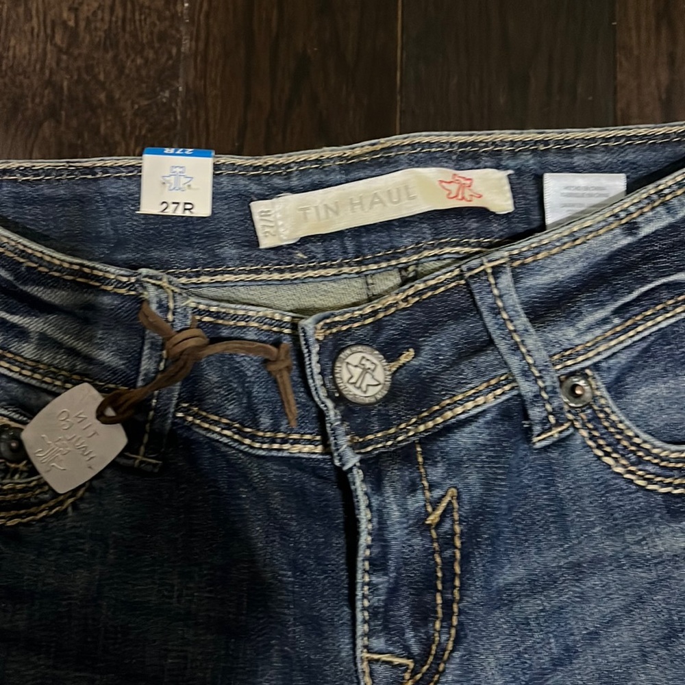 Brand New TinHauls NWT blue jeans - bootcut style . size 27R.